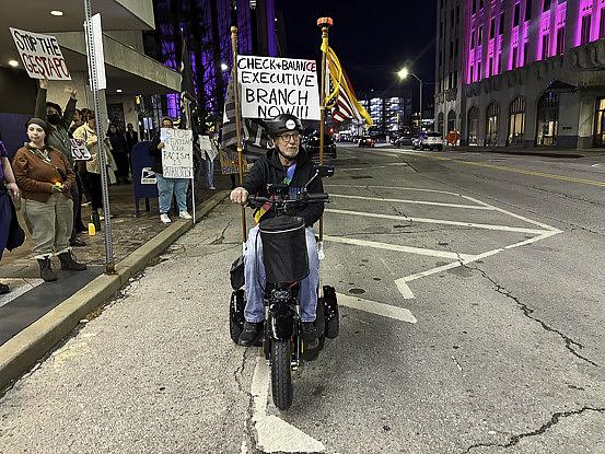 Demonstrators protest outside Sen. Markwayne Mullin's downtown Tulsa offices Jan. 8, 2026, following the killing of Renee Good by Immigration and Customs Enforcement.