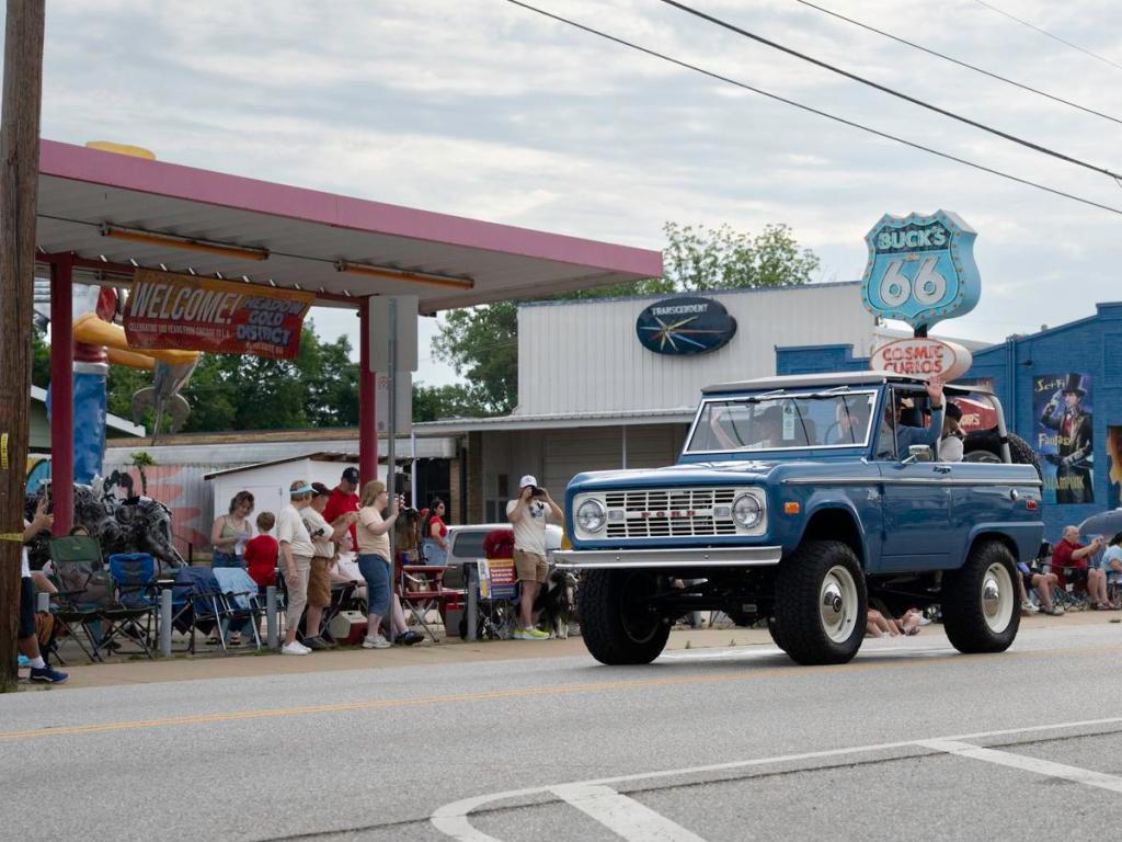 A classic car travels down 11th Street during the Route 66 Capital Cruise on May 30, 2026. The cruise was an effort to break a world record for largest classic car cruise.