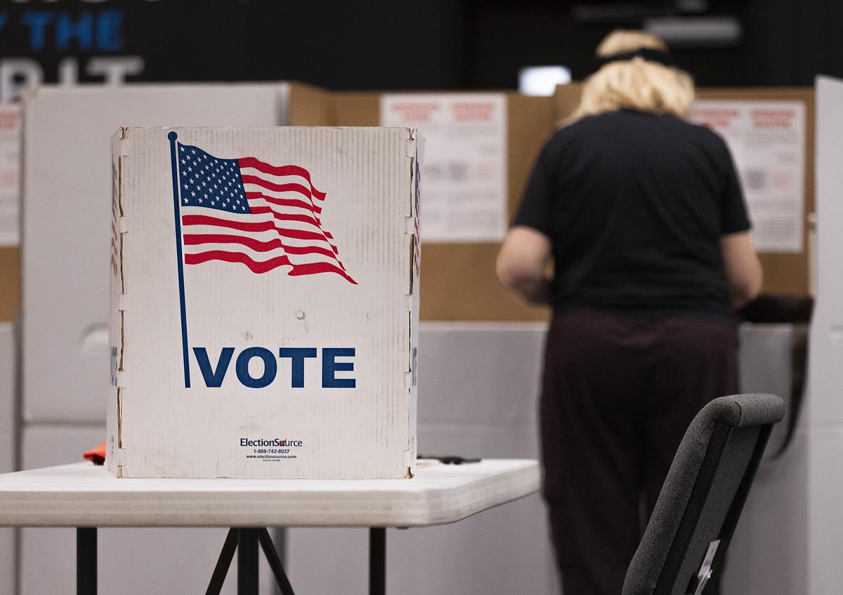 Voters fill out and cast their ballots at Broken Arrow's Aspen Creek Church polling station, April 7, 2026.