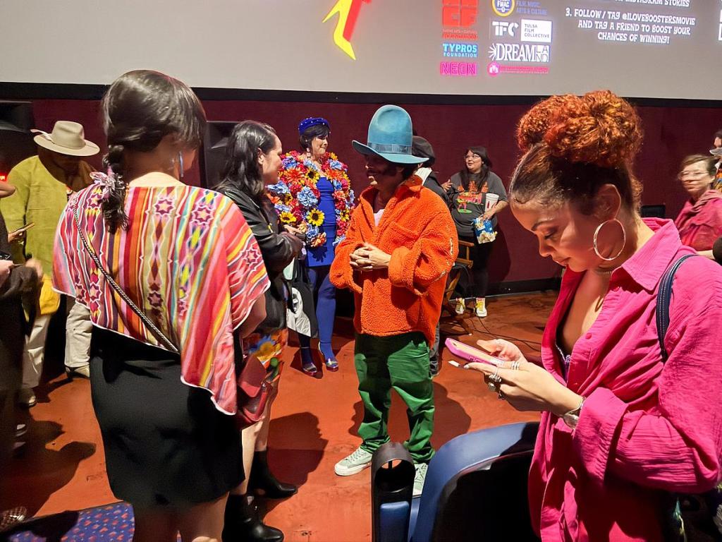 Filmmaker Boots Riley talks with moviegoers after the Oklahoma premiere of his "I Love Boosters" at Eton Square 6 on May 9, 2026.
