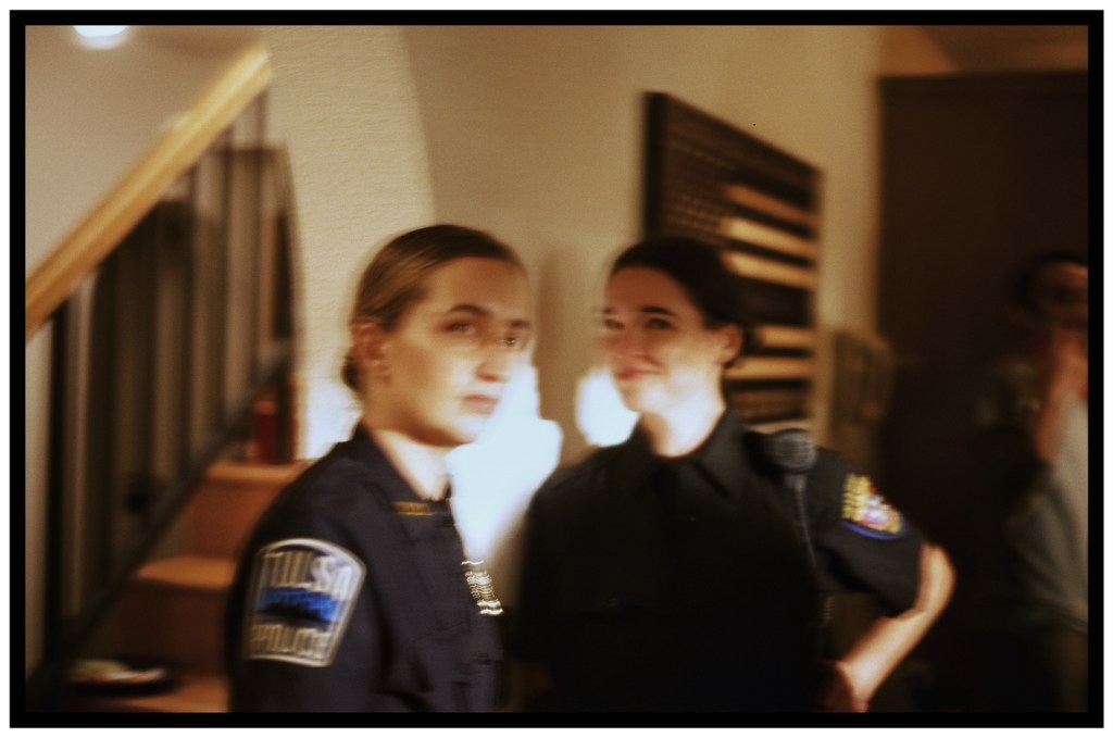 Tulsans Liz Blood and DeJon Knapp, who play local cops in "The Lowdown," in a behind-the-scenes shot on 35mm film.