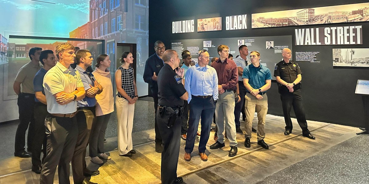 Raymond Doswell, executive director of Greenwood Rising, details Greenwood's early history to a group of Tulsa police officers and potential officers Oct. 10, 2025.