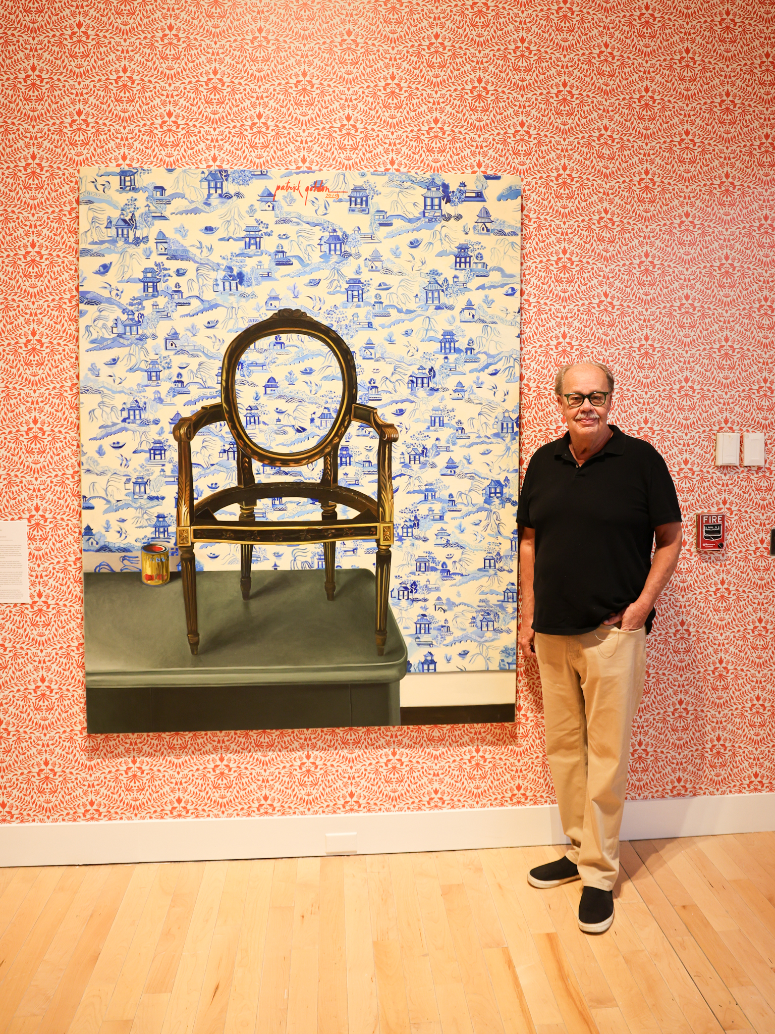 Patrick Gordon, pictured next to his painting at Philbrook Museum of Art