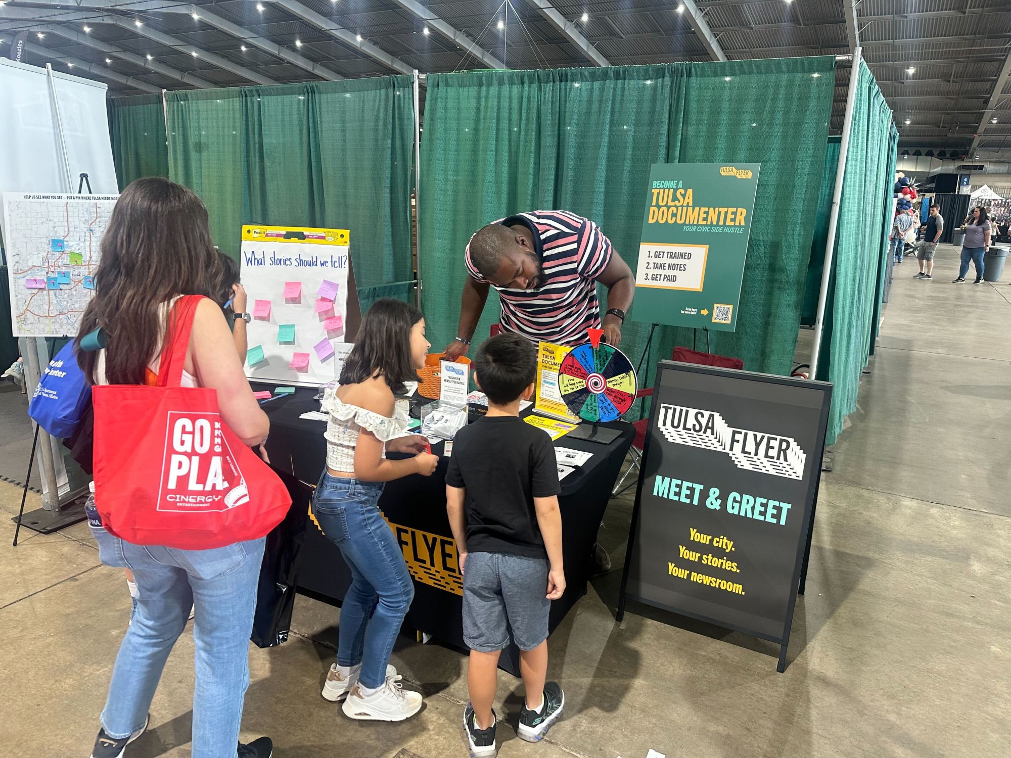 Ross Terrell, Managing Editor of The Oklahoma Eagle, talking with attendees at the State Fair