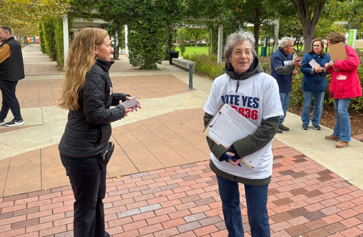Hayley Walters (left) and Leanne Fish stand outside as they look to engage with Tulsans to garner support for State Question 836 on Oct. 30, 2025.