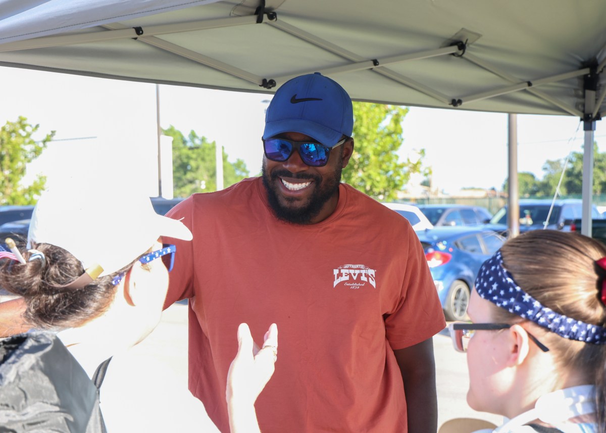 Photo of Ross Terrell speaking to community members
