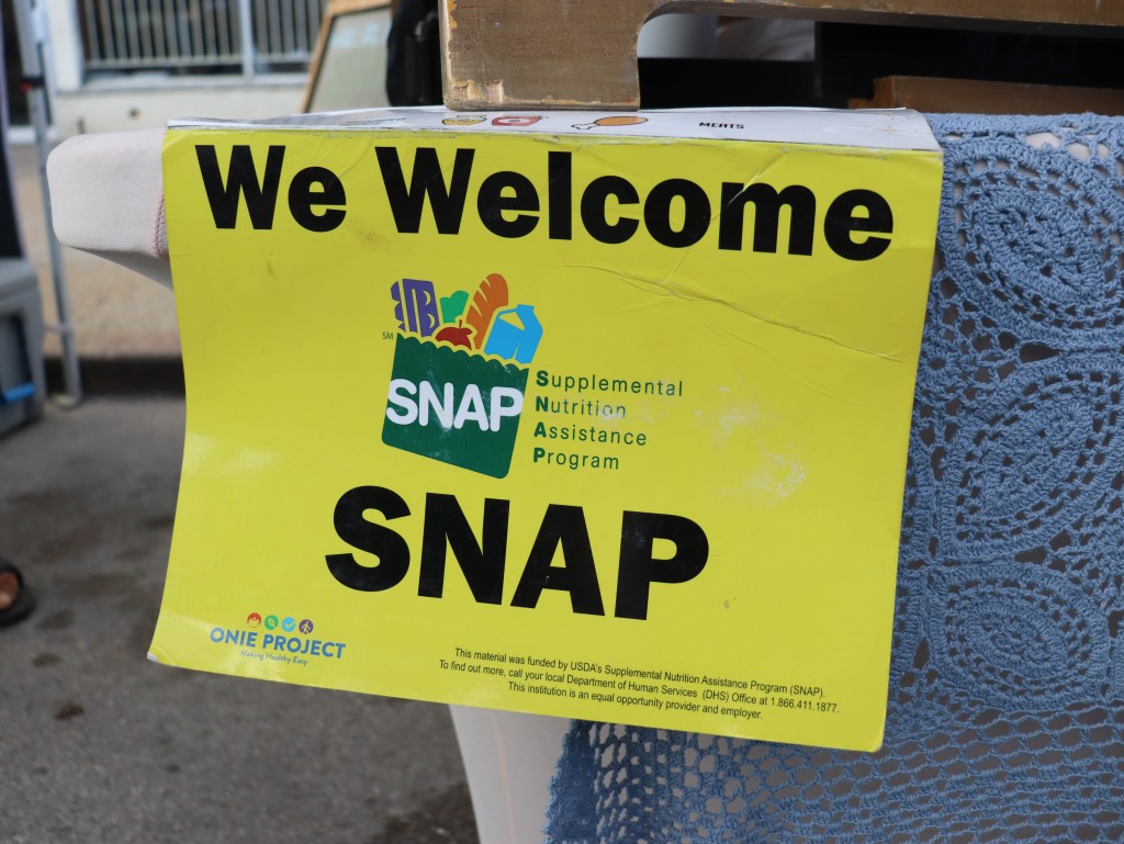 Photo of signs at the Tulsa Farmers Market