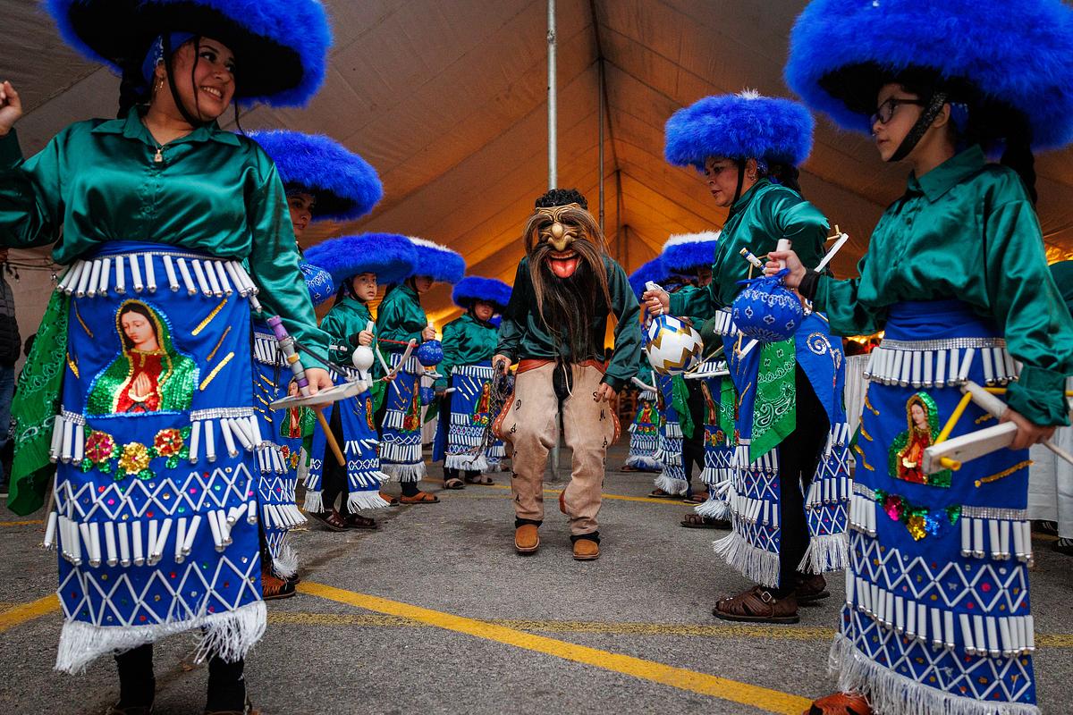 Danza Santa Maria performs at the Virgen De Guadalupe celebration at St. Thomas More Catholic Church on Dec. 11.