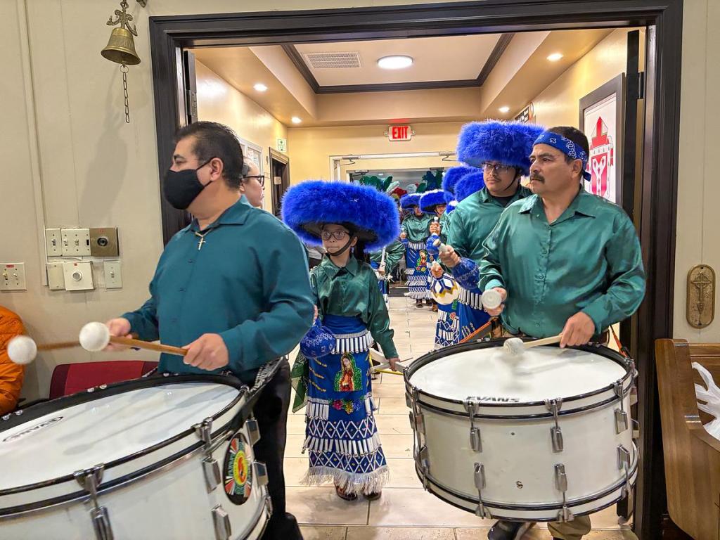Danza Santa Maria enters the temple at St. Thomas More Catholic Church on Dec. 11 to honor La Virgen de Guadalupe through danza. This performance is the most special since they’re performing in the church they attend regularly.
