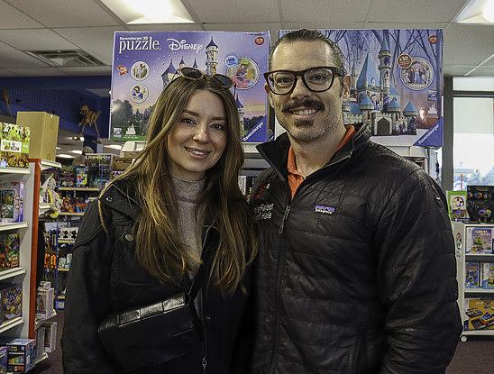Megan and Geoff Hale pose for a photo at Kiddlestix Toy Store.