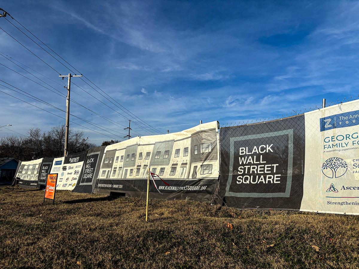 Fencing for Black Wall Street Square development on Dec. 11, 2025. The project is located on the corner of Martin Luther King Jr. Boulevard and East Reading St.