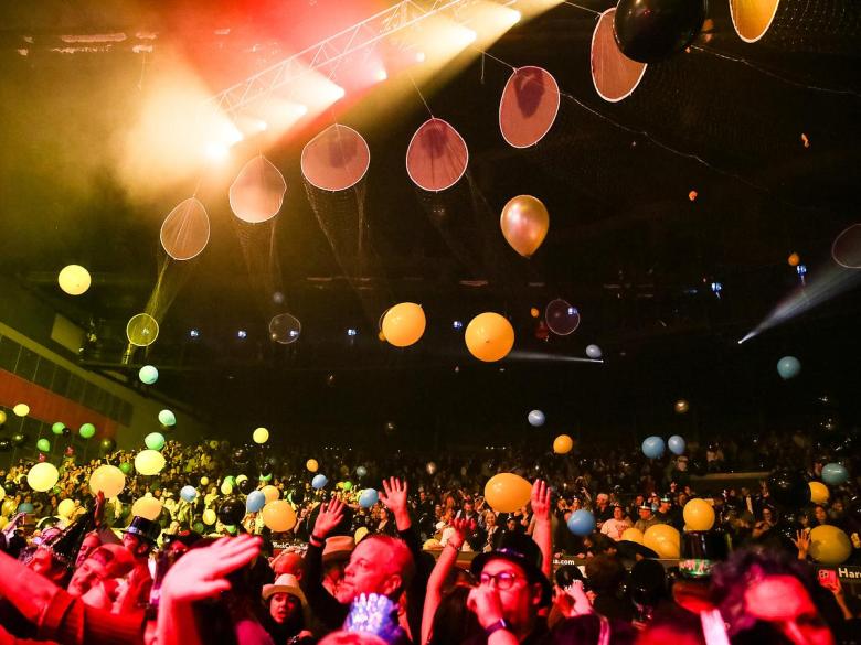 Party goers celebrate the new year with a balloon drop at Hard Rock Hotel & Casino Tulsa on Jan. 1, 2025.