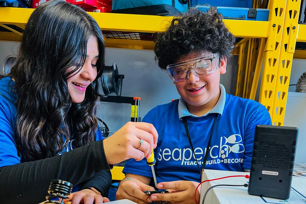 The Tulsa Regional STEM Alliance's MOMENTUM program issues special badges students who demonstrate skills in STEM.