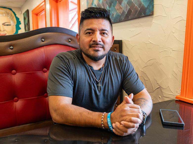 Man sits in Mexican restaurant