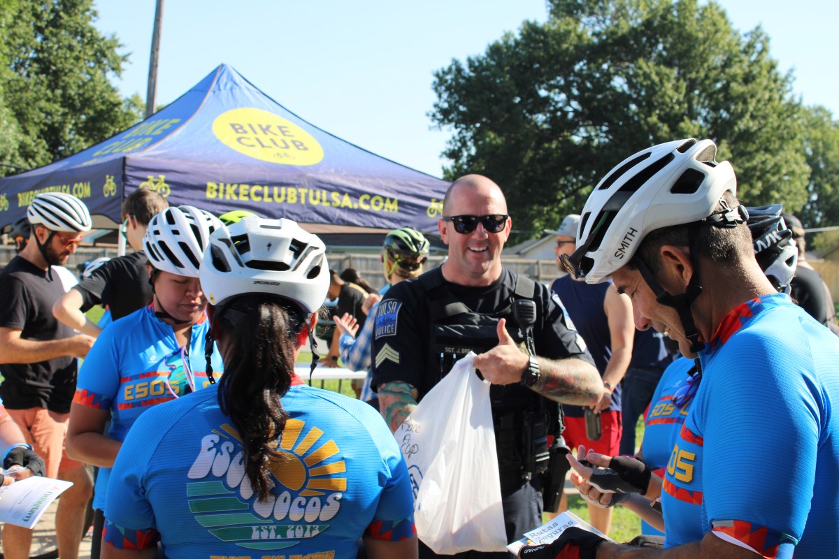 Photo of police officer and cyclists