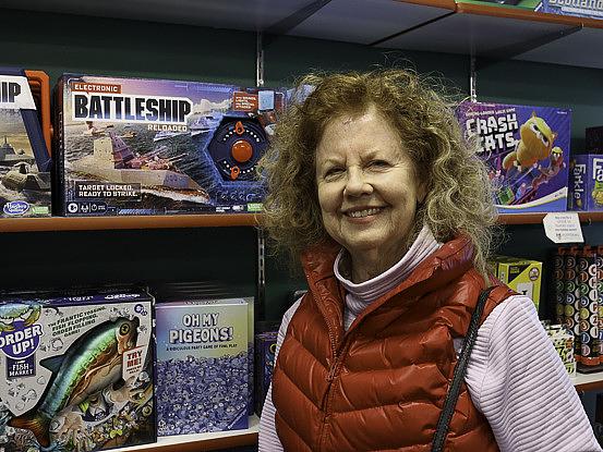 Harriet Derrevere poses for a photo at Kiddlestix Toy Store.