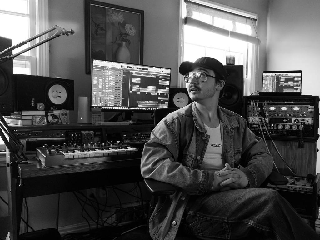 Musician and producer Logan Bruhn works in his home studio Jan. 21, 2026.