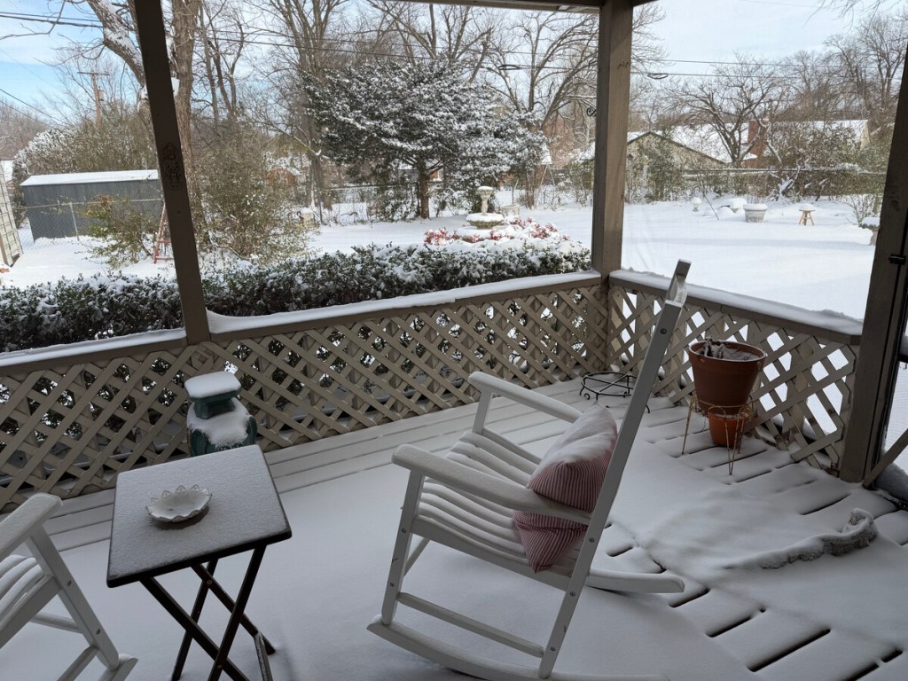 A snow-covered porch near 61st and Sheridan Jan. 25, 2026.