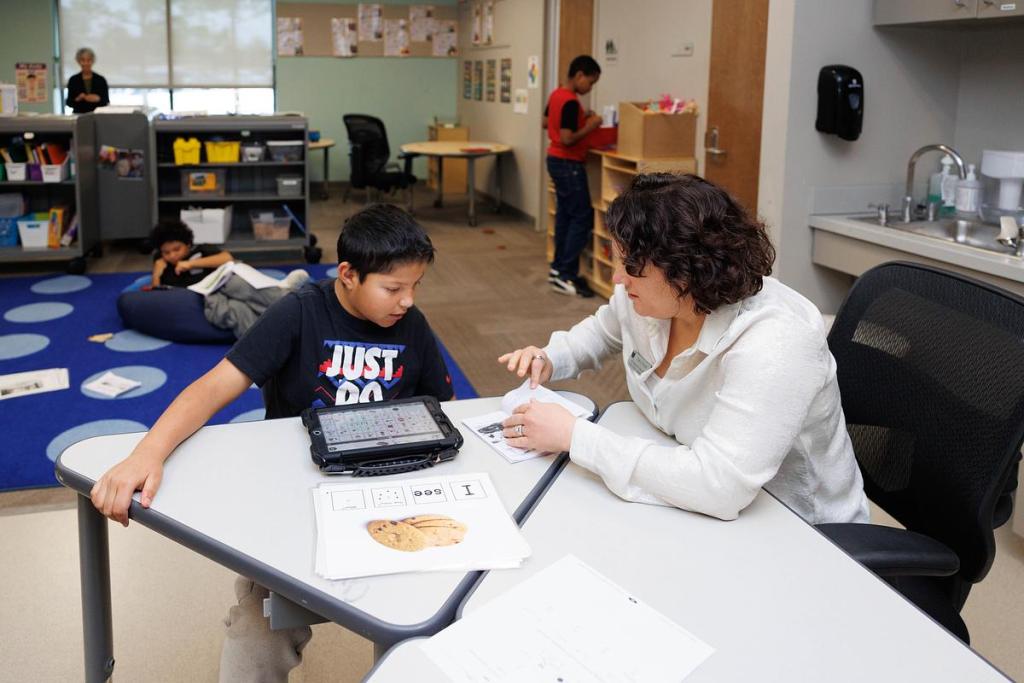 Emily Wade works with a student in her classroom at Ellen Ochoa Elementary on Dec. 8, 2025.