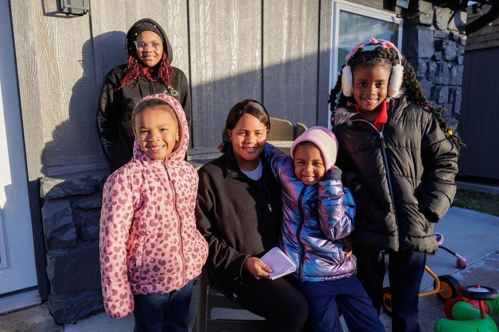From left to right: Jordyn Mcgruder, Knylah Grundy, Taleece Cherry, Kaleece Grundy and Skyler Horn stand at Wykeyma Crockett’s home daycare in east Tulsa, Jan. 16, 2026. Taleece Cherry, their mom, says Crockett’s day care helped create a “village” for her children. 