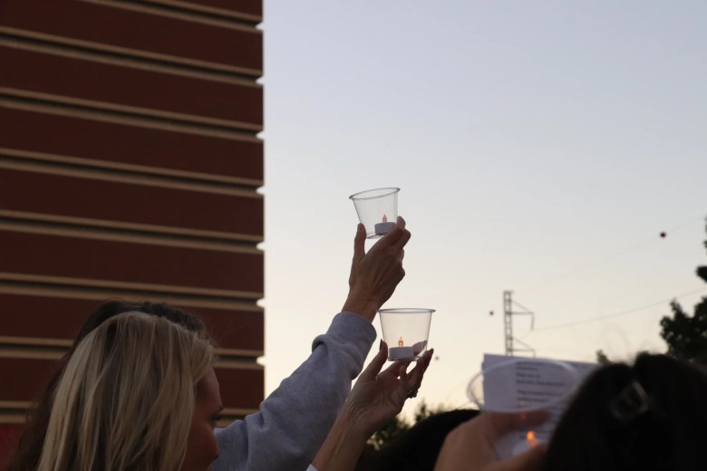 Participants raised candles in front of the Oklahoma County jail to recognize people who have been detained by ICE.