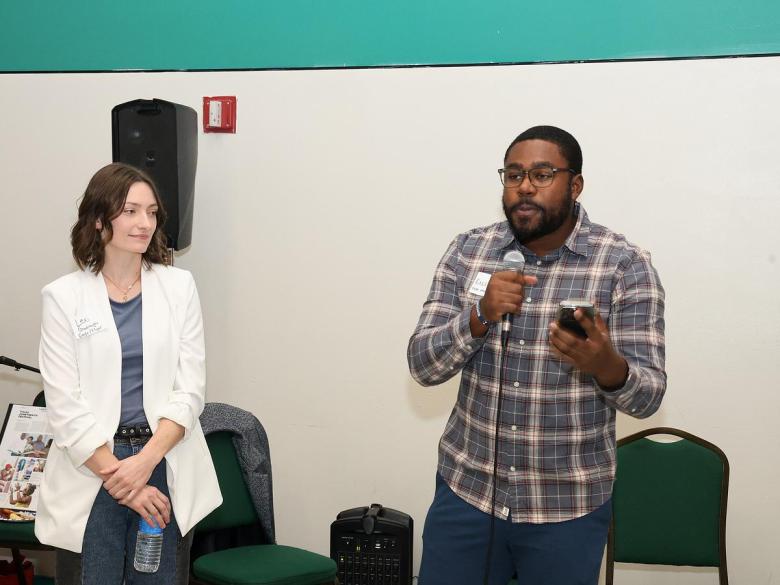 Ross Terrell, right, speaks at The Oklahoma Eagle's relaunch party at Greenwood Cultural Center in December 2025. Credit: Tim Landes / Tulsa Flyer