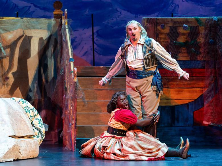 Apprentice pirate Frederic, played by Chris Mosz, is startled by the depth of the affection from nursemaid Ruth, played by Tesia Kwarteng, in Tulsa Opera’s "The Pirates of Penzance."