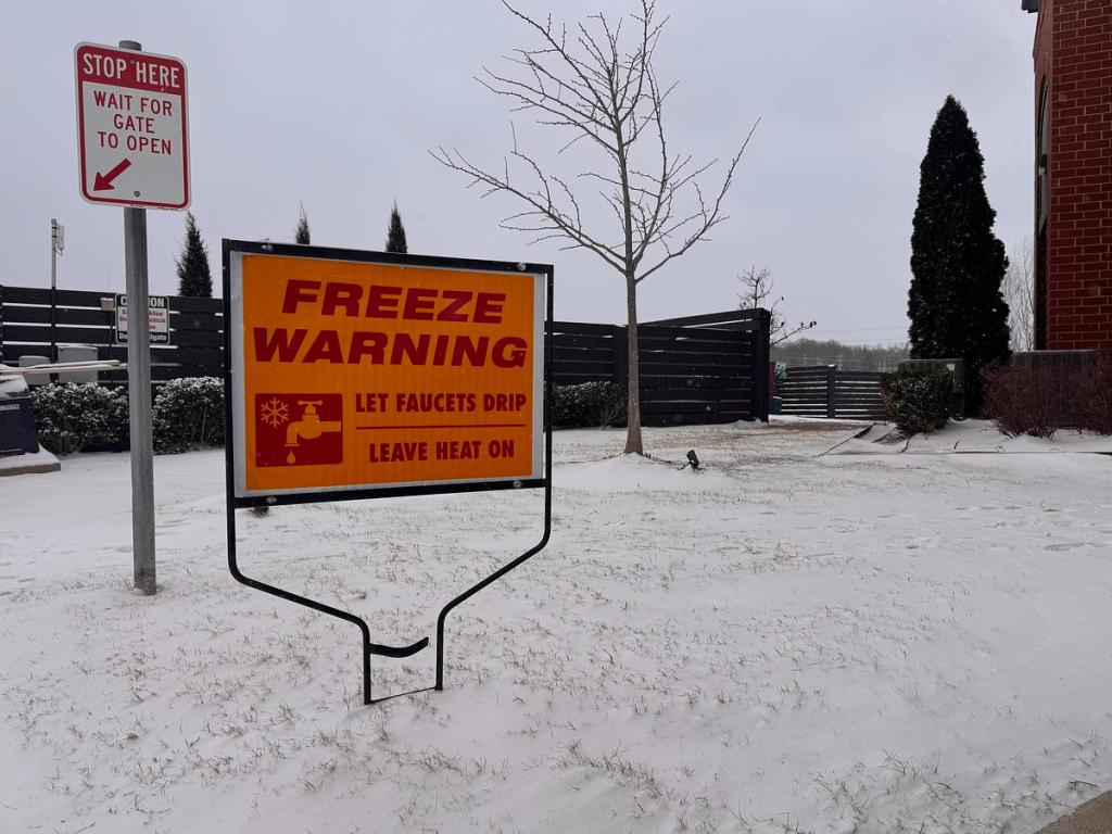 A sign warns of freezing temperatures near 71st and Elwood Jan. 24, 2026.
