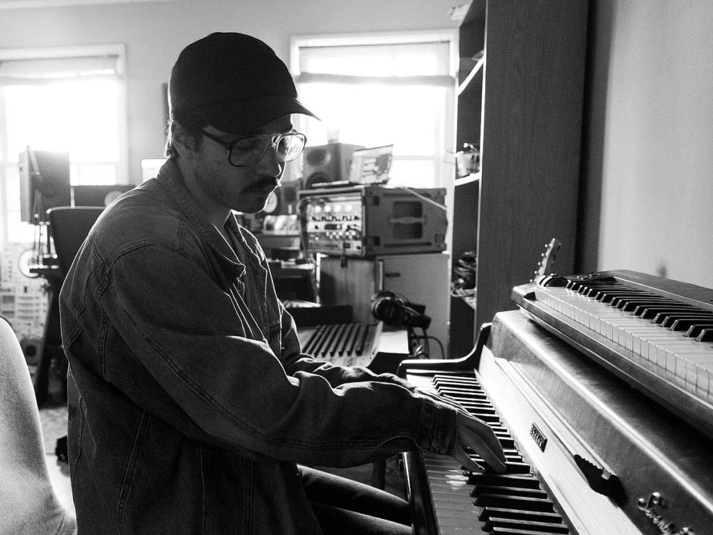 Musician and producer Logan Bruhn works in his home studio Jan. 21, 2026.