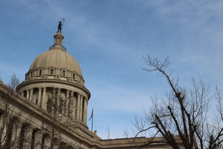 The dome of the Oklahoma state Capitol seen from behind the Connors Building.