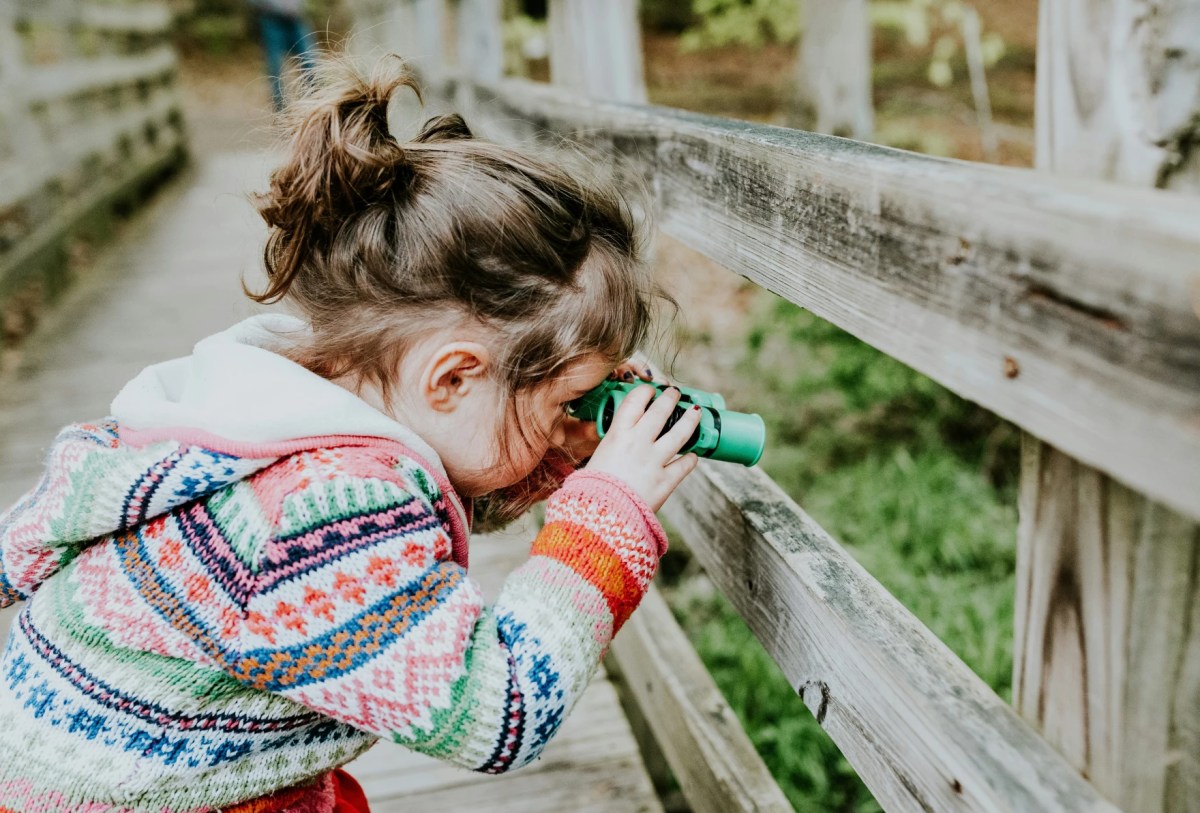 A child explores nature.