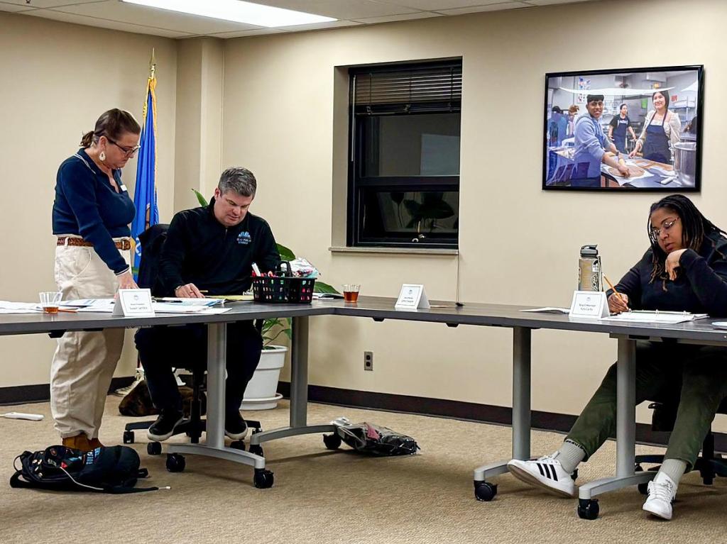 Tulsa Public Schools board members Susan Lamkin, John Croisant and Kyra Carby work on new mission statements for the district’s next five-year plan during a Feb. 4, 2026, meeting. 