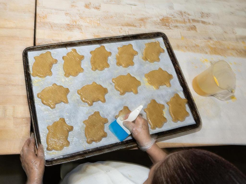 Cecilia Sandoval preps puerquitos before they go in the oven inside the Pancha Anaya bakery at 40 S. Garnett Road on Feb. 20, 2026.