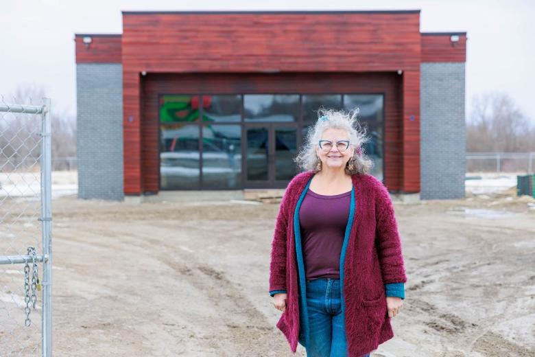 Crista Patrick, the executive director of Tulsa Metropolitan Ministry, stands in front of The Bazaar grocery store development in Tulsa Jan. 30, 2026.
