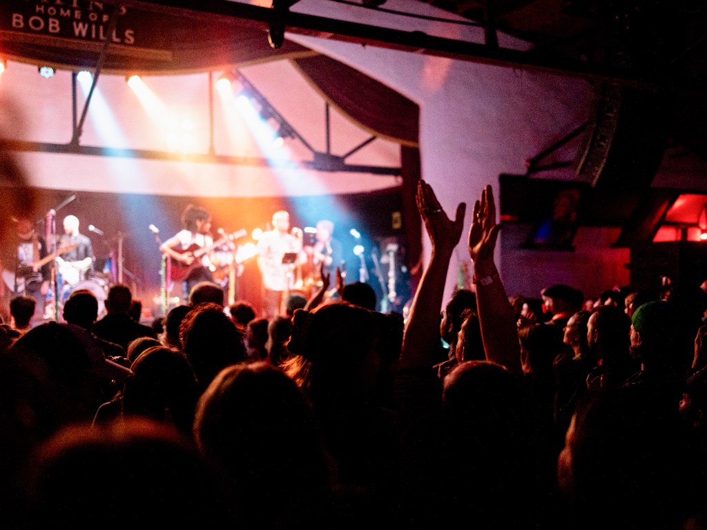 band plays in front of audience