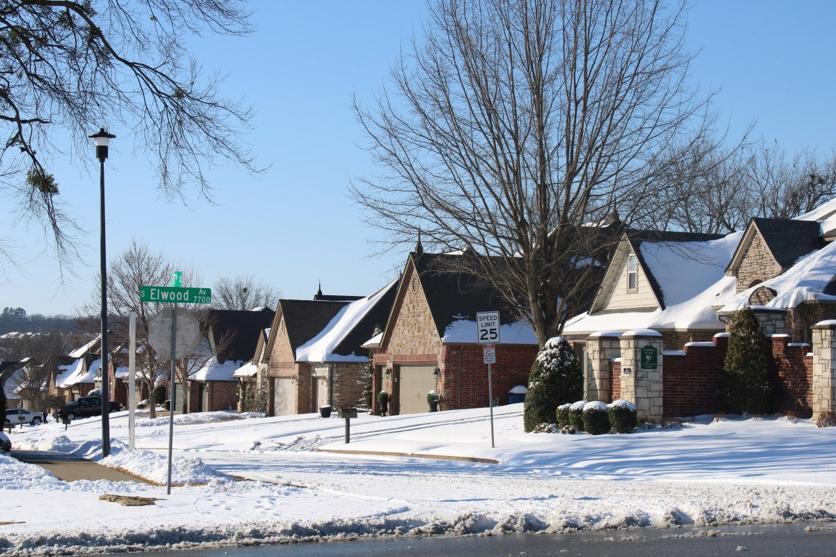 Snow tops the roofs of homes in Jenks after a snow storm hit the Tulsa region in January 2026.