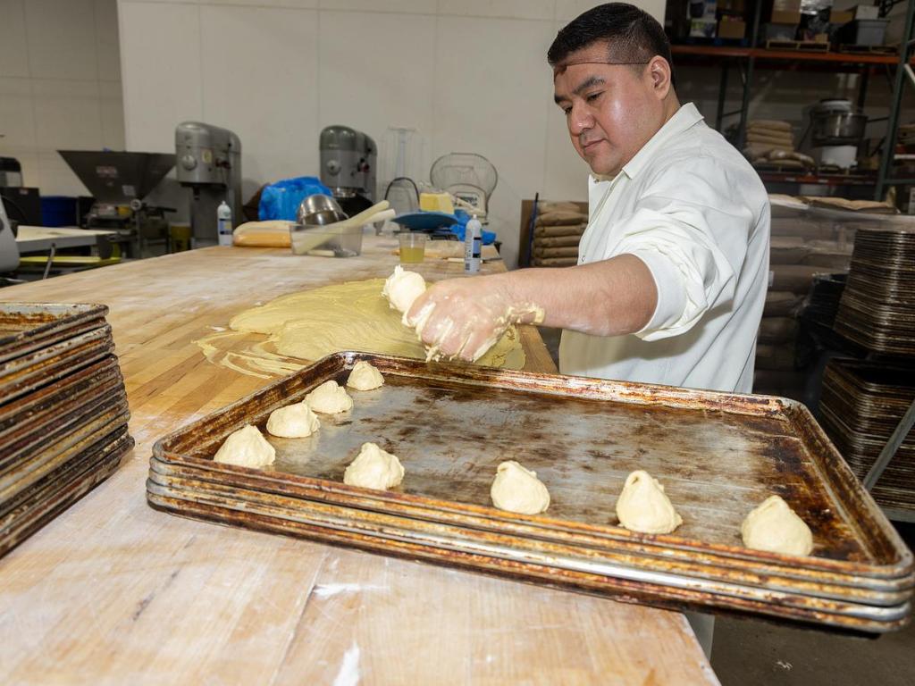 Hector Carrera works inside the Pancho Anaya bakery at 40 S. Garnett Road Feb. 20, 2026.