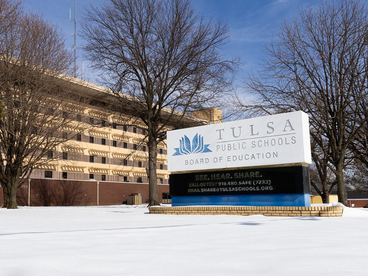 Snow covers the grounds of Tulsa Public Schools headquarters at the Charles C. Mason Education Service Center Jan. 27, 2026.
