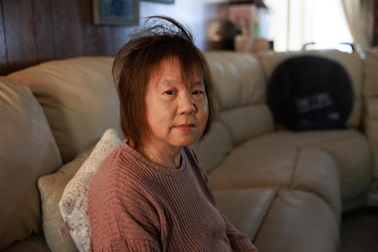 Bea Thao sits in her living room as she shares her experience from arriving in Tulsa from Laos in 1976. Her family was sponsored by The First Lutheran Church on 13th and Utica.