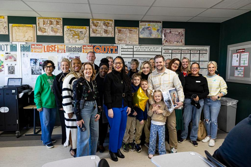 Kraig Mewbourne is surprised by Tulsa Public Schools Superintendent Ebony Johnson. corkers and family as he is presented with his nomination for 2026 Teacher of the Year on Thursday, March 12, 2026, at Tulsa Edison Preparatory School in Tulsa, Okla.