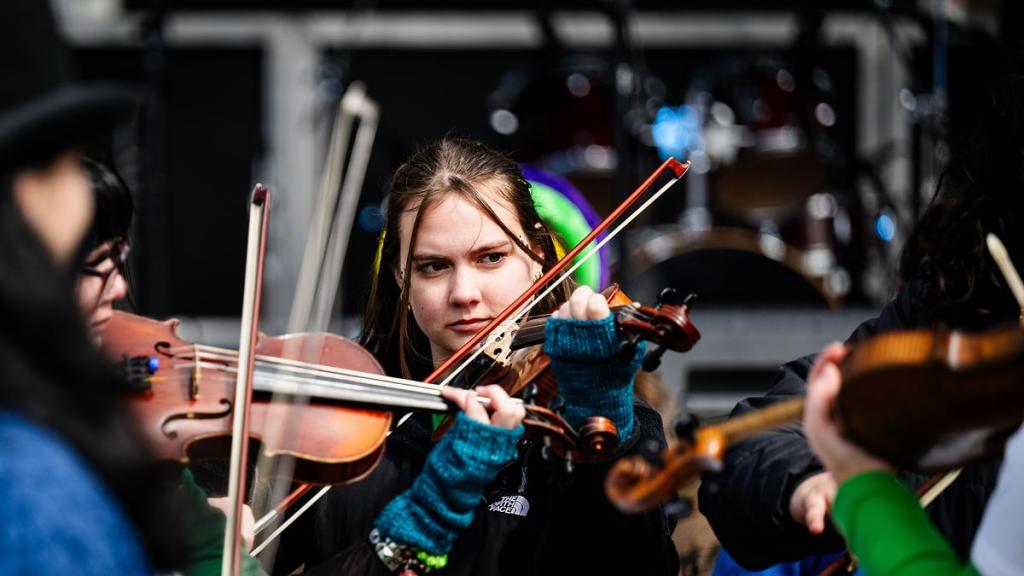 Musicians play Irish music during the St. Patrick’s Day celebration outside Killkenny's Irish Pub March 17, 2026. The block party included multiple bars, children's activities, music and more.