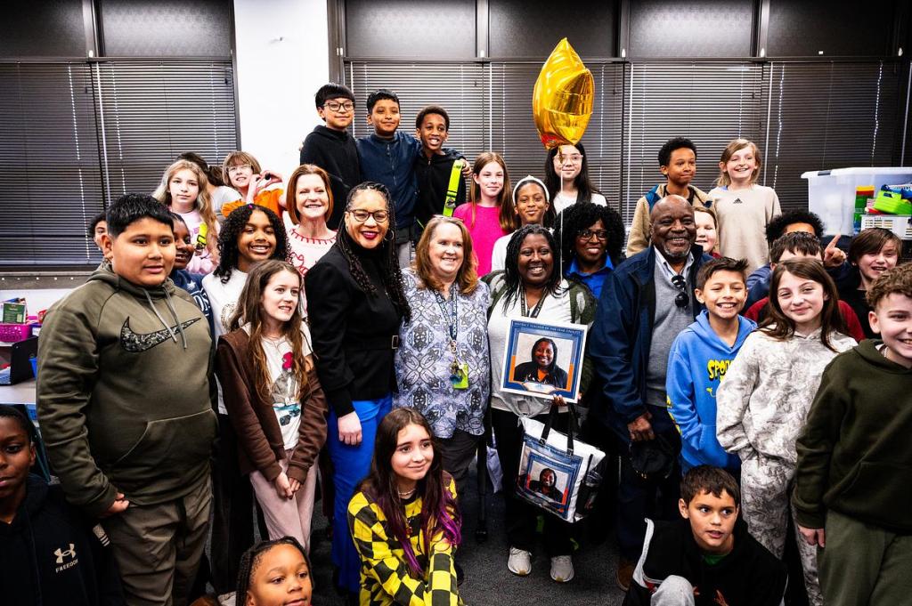 Akela Leach smiles with her fifth grade class after being nominated as one of this year's teachers of the year on Thursday, March 12, 2026.