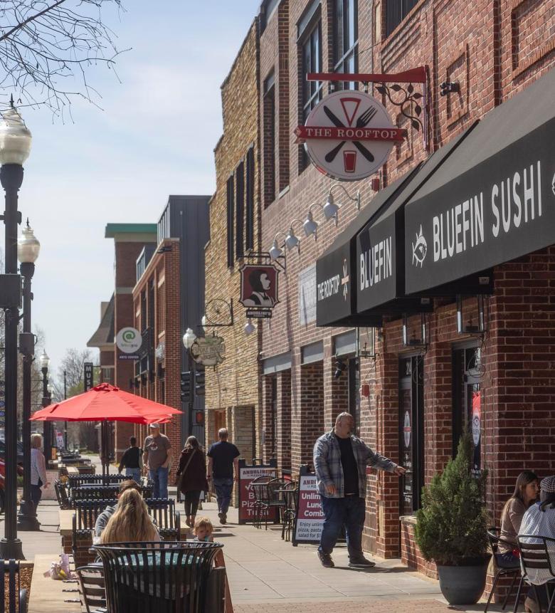 Shoppers walk through downtown Broken Arrow's Rose District March 13, 2026. Improvements to the plaza are included in the city's 2026 bond proposal.