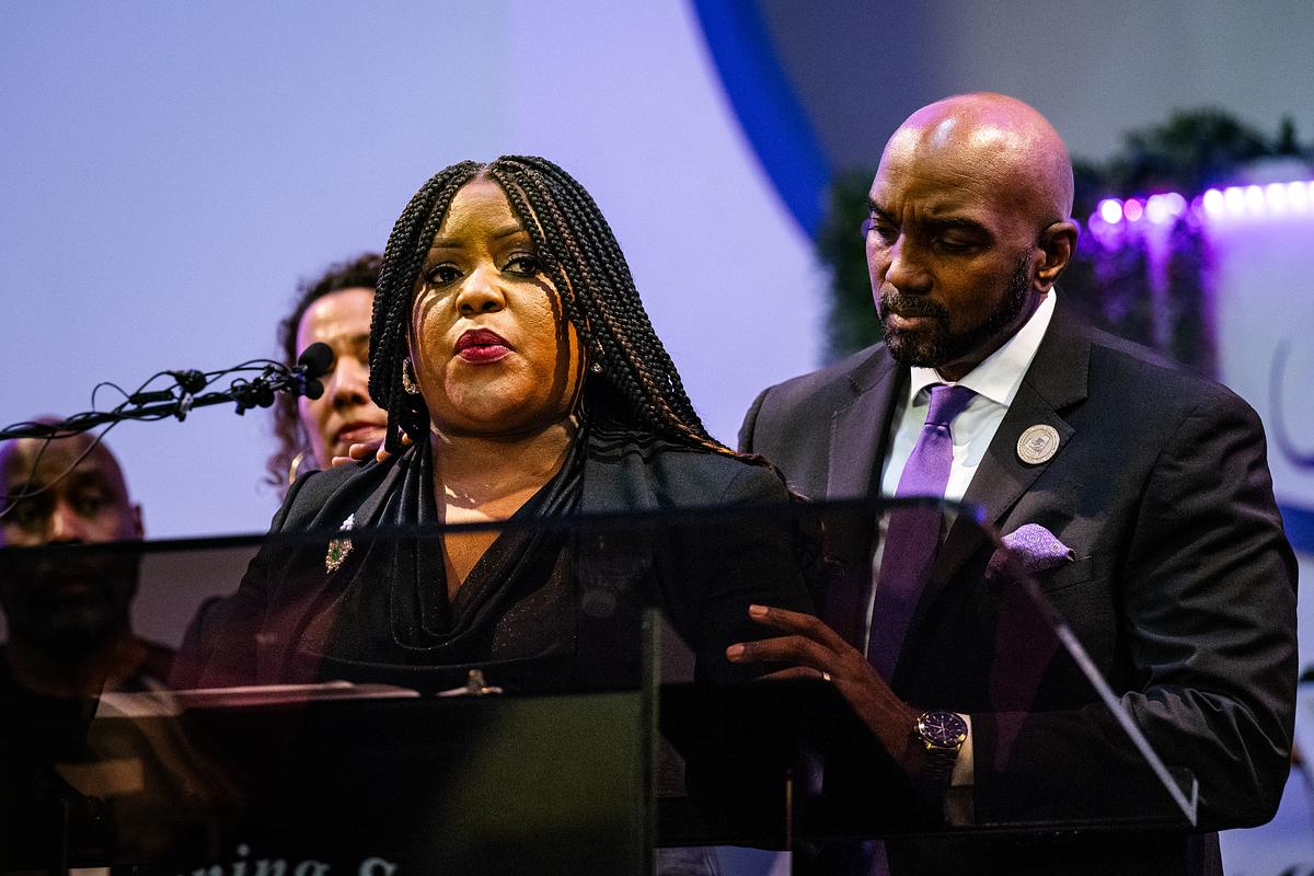 Tiffany Crutcher, sister of Terence Crutcher, left, is comforted by attorney Damario Solomon-Simmons while speaking during a March 31, 2026, press conference about the family's civil lawsuit against former TPD officer Betty Shelby.