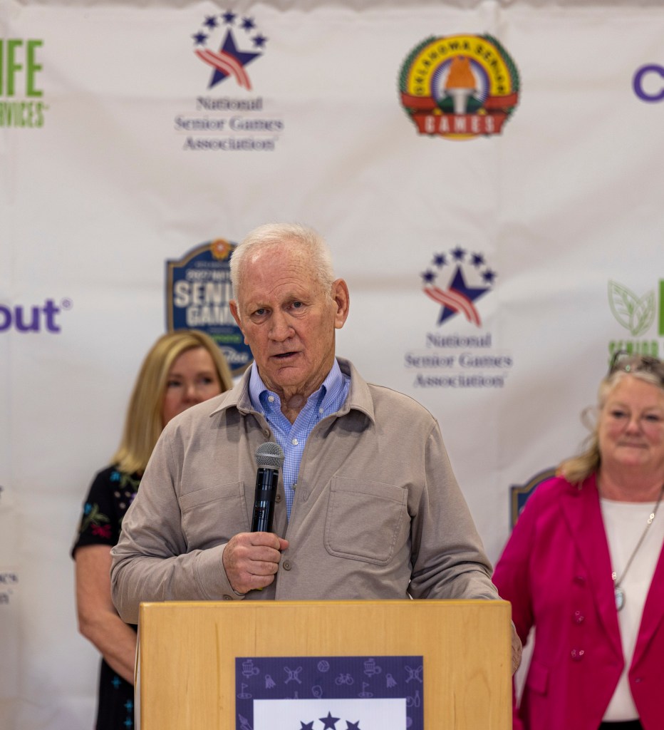 man speaks during press conference