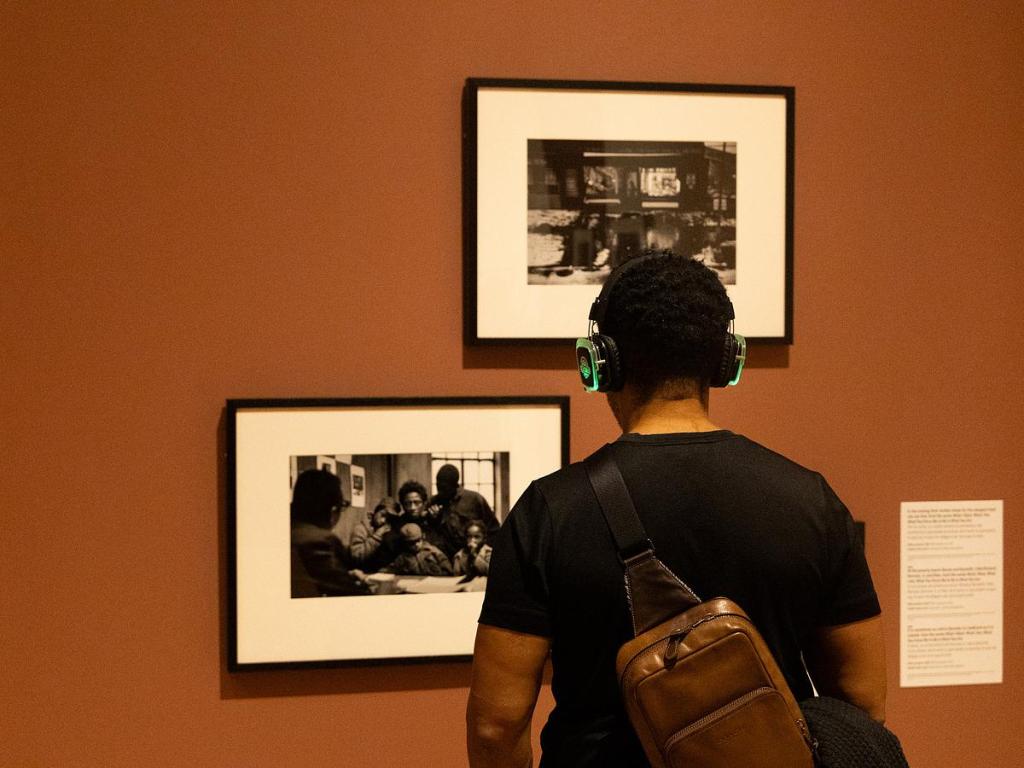  A scene from Dreamland Tulsa presents "A Journey Through Art, Music and Cinema" at Philbrook Museum of Art on Feb. 27, 2026.  Attendees look at Gordon Parks photography during Dreamland Tulsa presents "A Journey Through Art, Music and Cinema" at Philbrook Museum of Art on Feb. 27, 2026. 