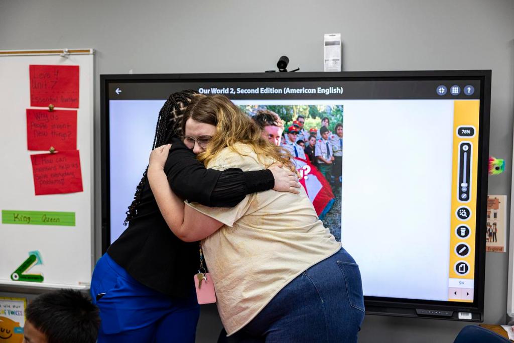 Sarah Baker receives her nomination for Tulsa Public Schools Teacher of the Year from Superintendent Ebony Johnson at Hawthorne Elementary School on Thursday, March 12, 2026, in Tulsa, Oklahoma.
