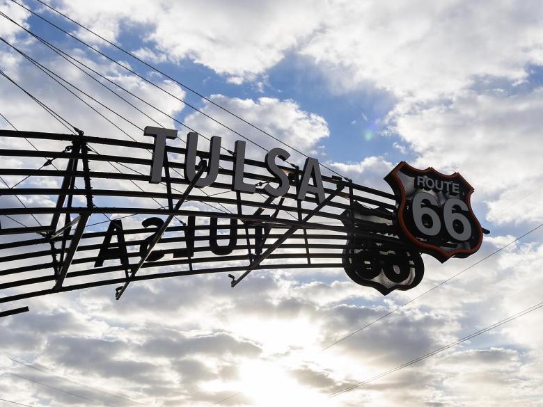 East Tulsa commuters pass by Route 66 signage on East 11th Street on Feb. 20, 2026.