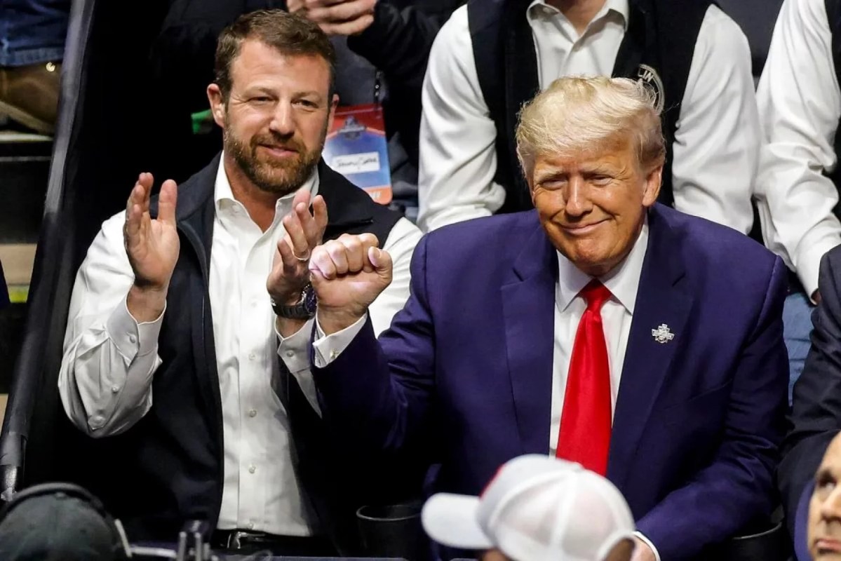 Oklahoma U.S. Senator Markwayne Mullin and President Donald Trump watch the NCAA D1 Wrestling Championship Finals at the BOK Center in Tulsa, Okla. on March 18, 2023.