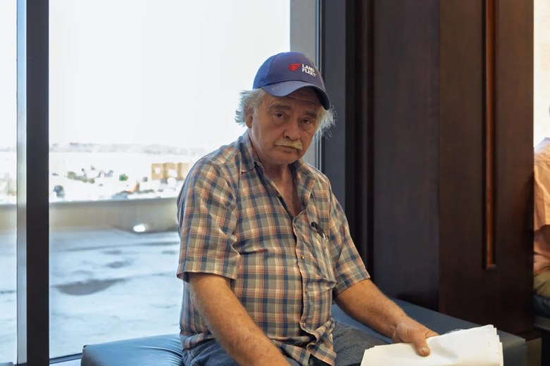 Frank Myers sits outside a courtroom on the third floor of the Rogers County Courthouse on Feb. 18, 2026.
